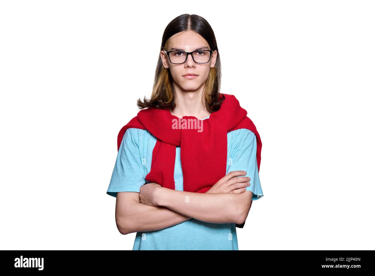 Portrait of serious teenage guy looking at camera on white isolated ...
