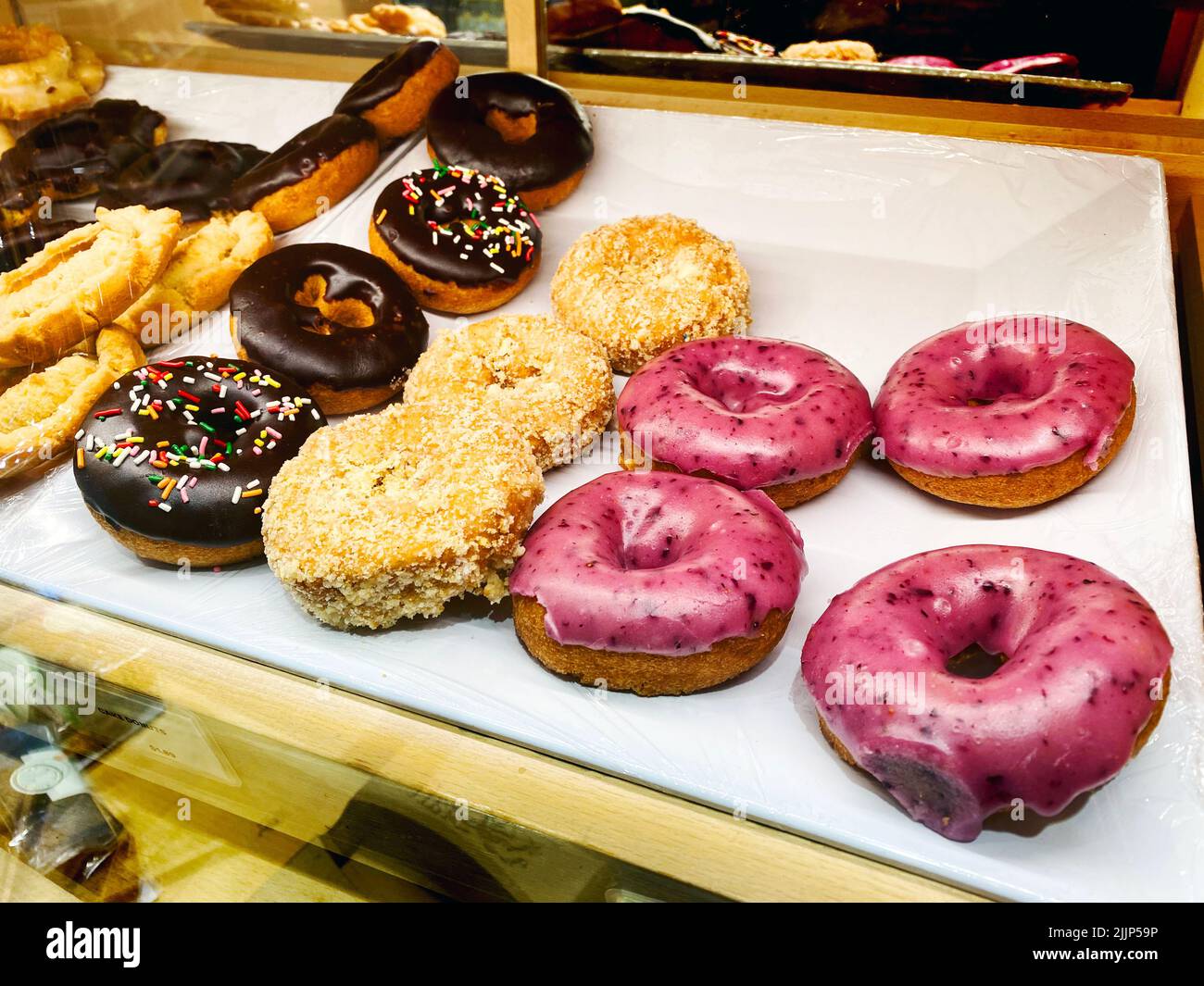An assortment of donuts in a bakery Stock Photo Alamy