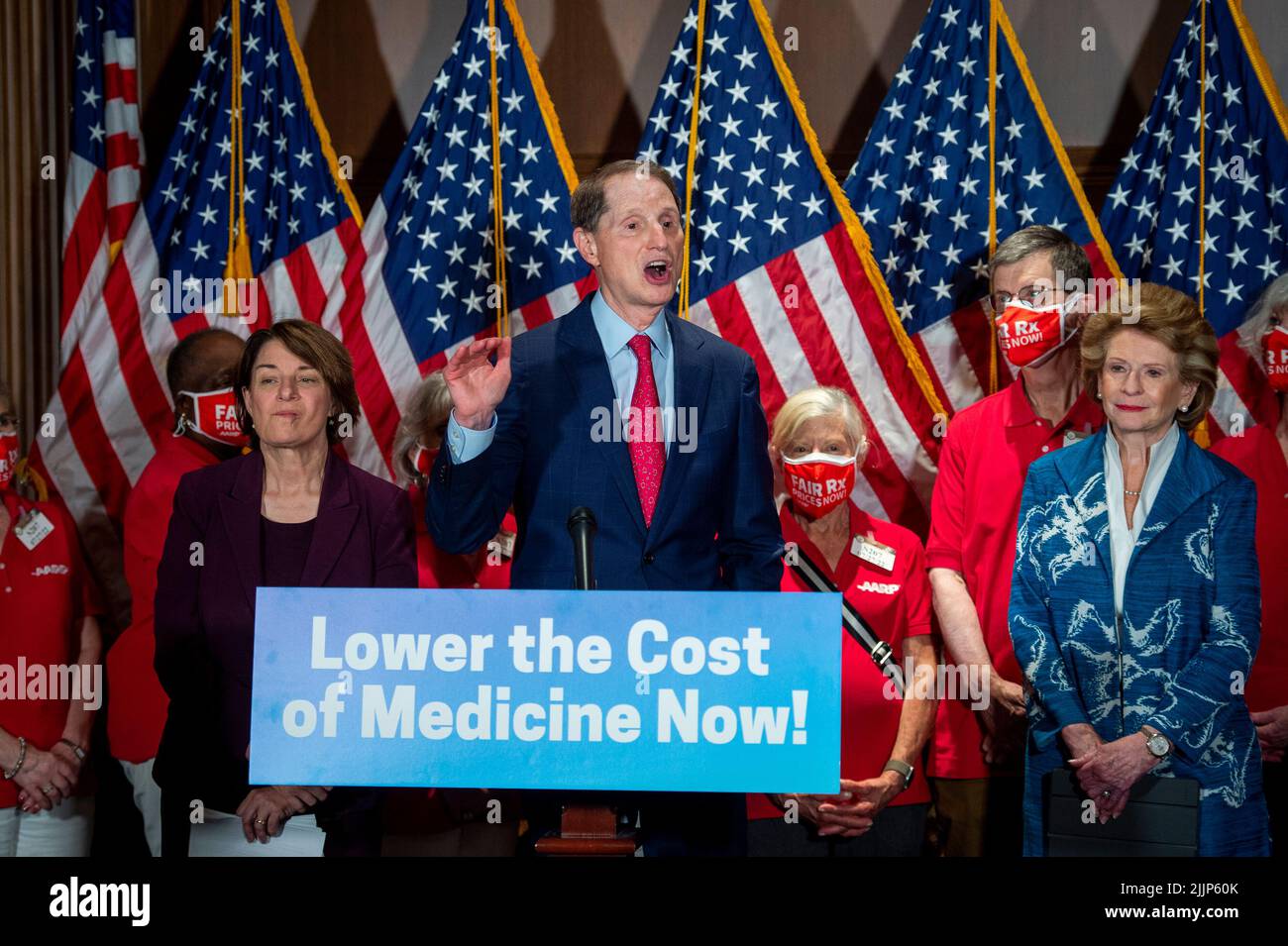 United States Senator Amy Klobuchar (Democrat of Minnesota), left, and United States Senator Debbie Stabenow (Democrat of Michigan), right, listen while United States Senator Ron Wyden (Democrat of Oregon), center, offers remarks during press conference on the prescription drugs legislation to strengthen the Medicare program, significantly cut costs for families, and penalize bad actor drug companies, at the US Capitol in Washington, DC, July 27, 2022. Credit: Rod Lamkey/CNP Stock Photo