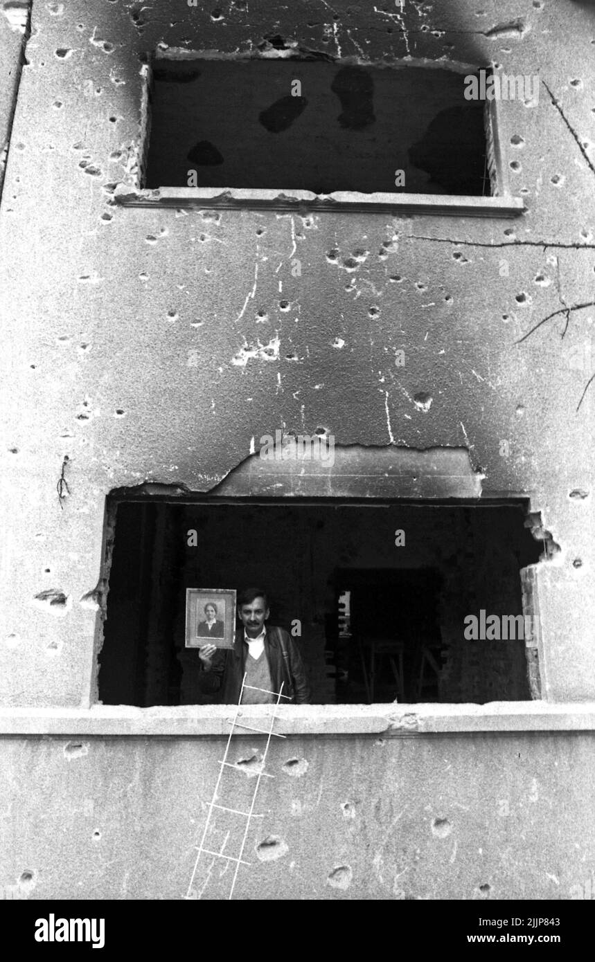 Bucharest, Romania, January 1990. Buildings deteriorated by the gunfire during the Romanian anticommunist revolution of December 1989. Stock Photo