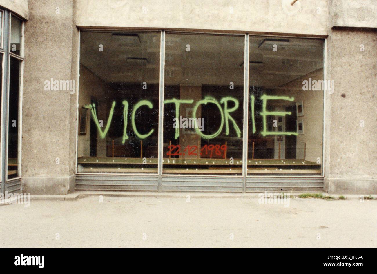 Bucharest, Romania, January 1990. 'Victory! December 22, 1989'- message spray-painted in downtown Bucharest during the anticommunist revolution. Stock Photo