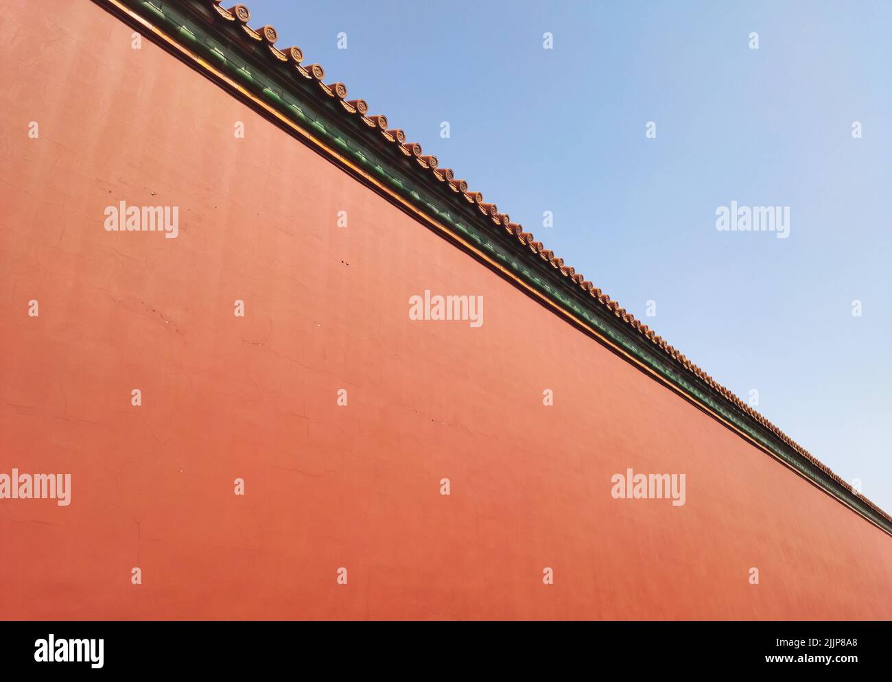 The beautiful exterior of the red-painted walls of the Palace Museum in China Stock Photo