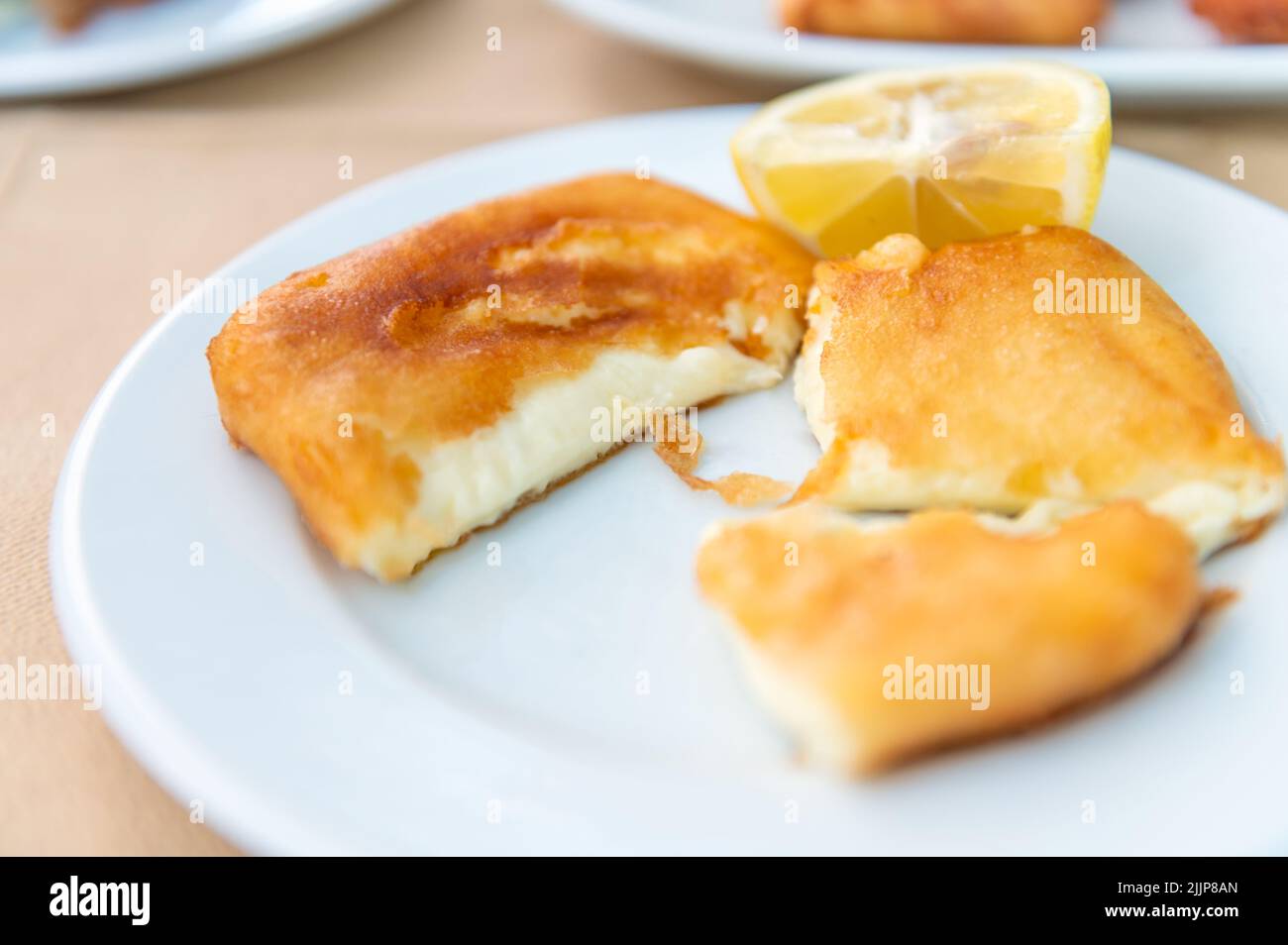 Greek Fried Cheese, Saganaki Stock Photo - Alamy