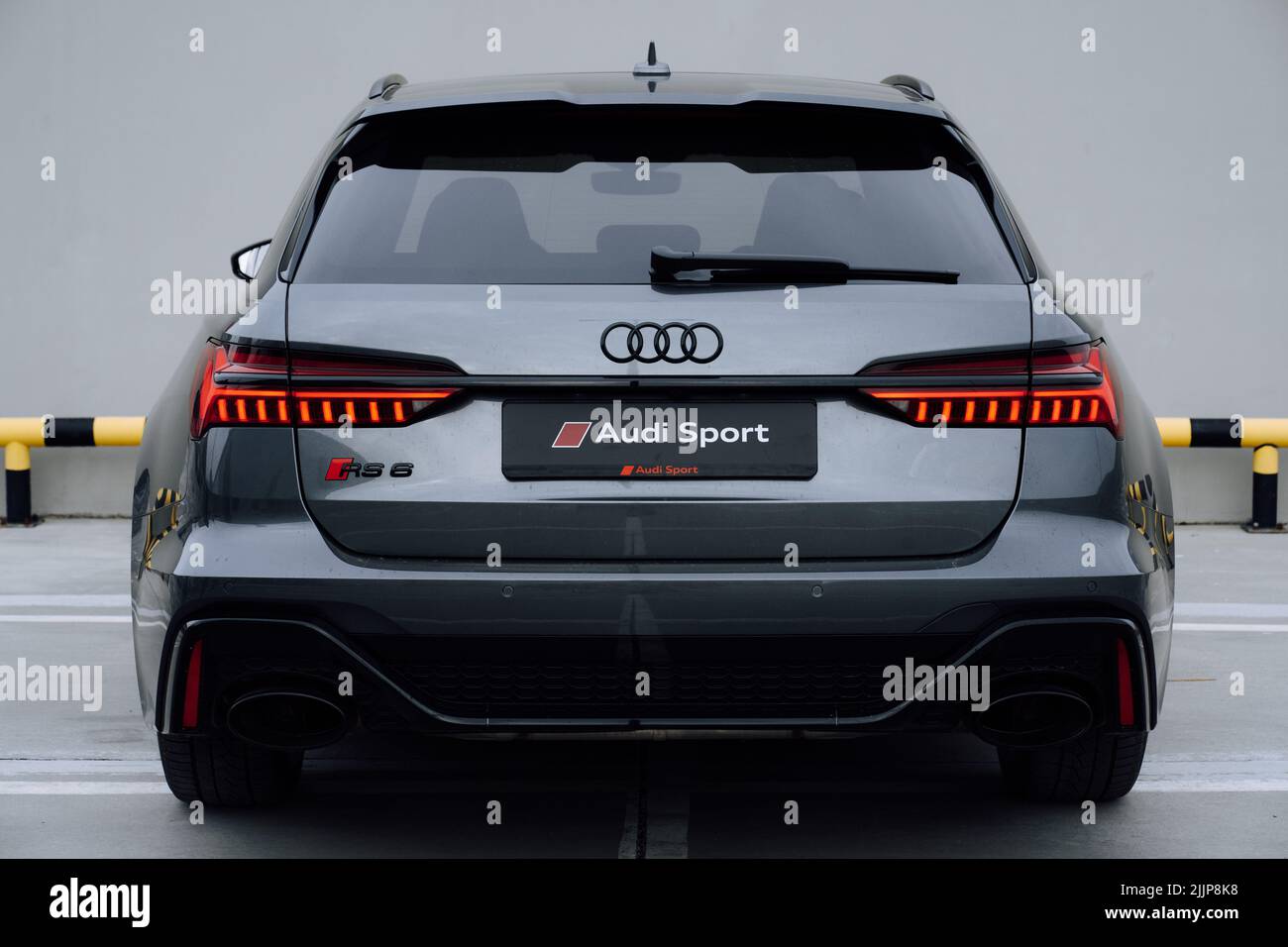 A brand new silver Audi RS 6 in a parking lot Stock Photo