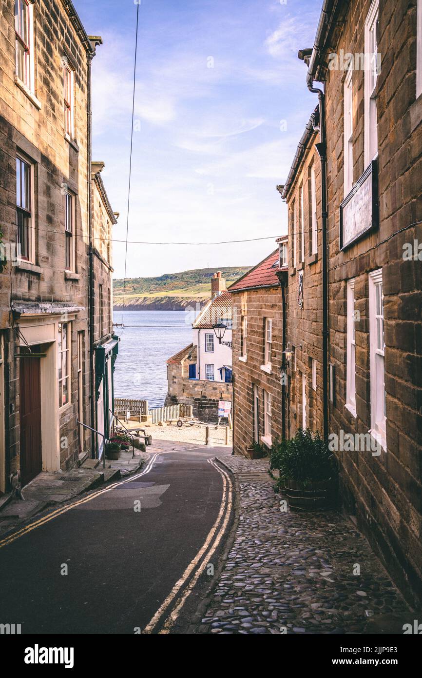 A vertical shot of English traditional houses at the Robin's Hood Bay