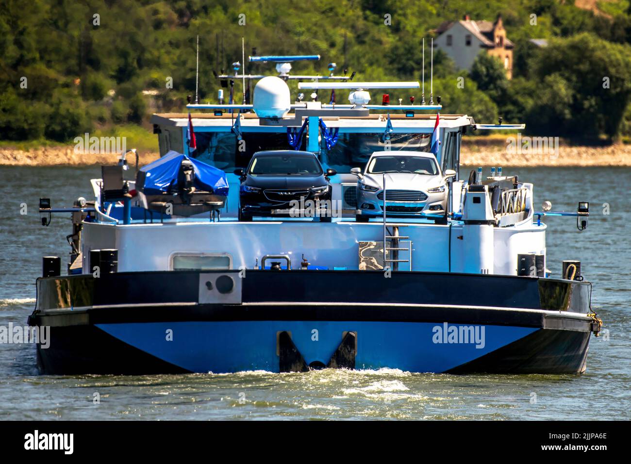 Car ferry sailing across Rhine, North Rhine Westphalia, Germany Stock