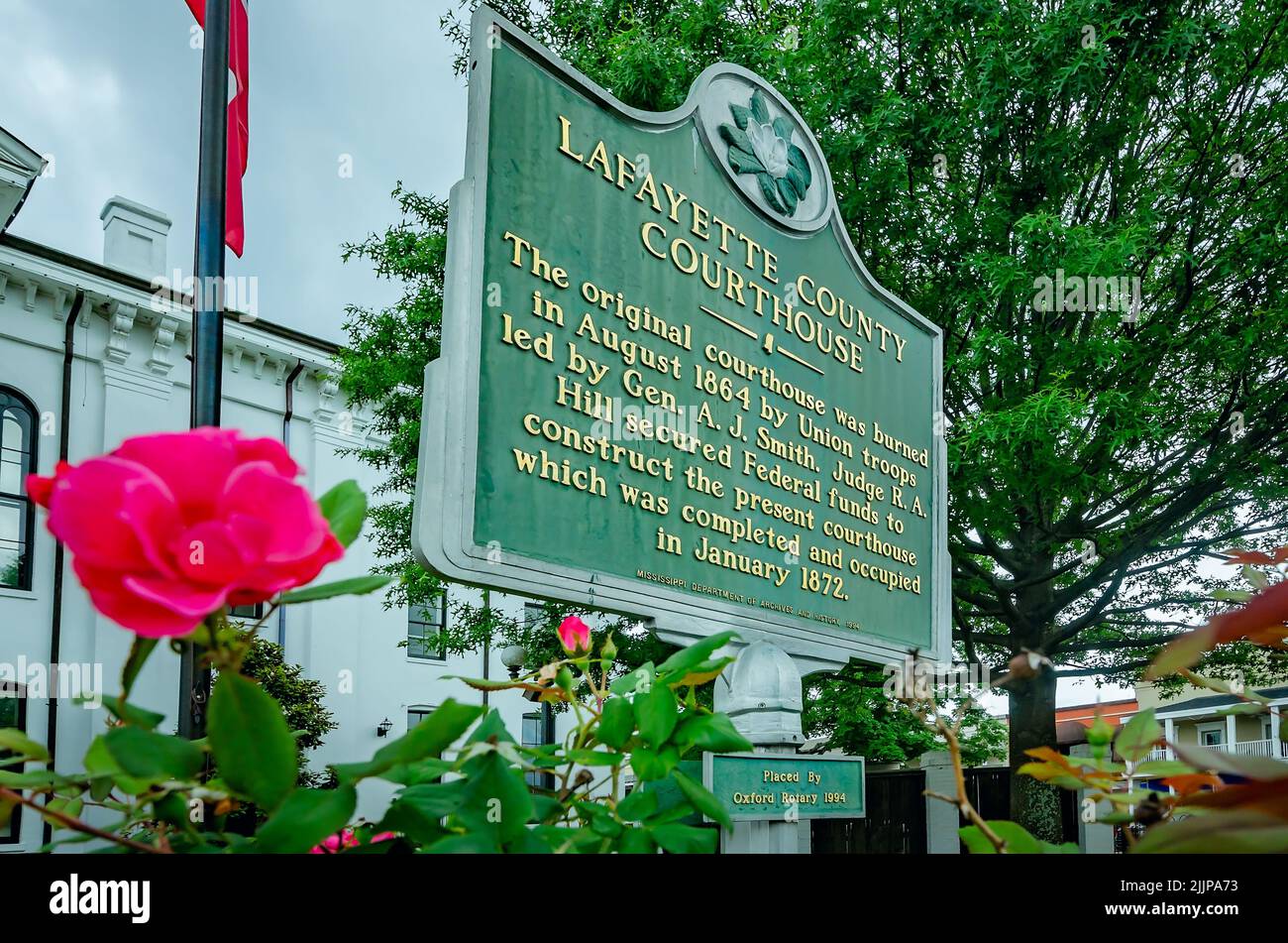 A historic marker stands in front of the Lafayette County Courthouse in
