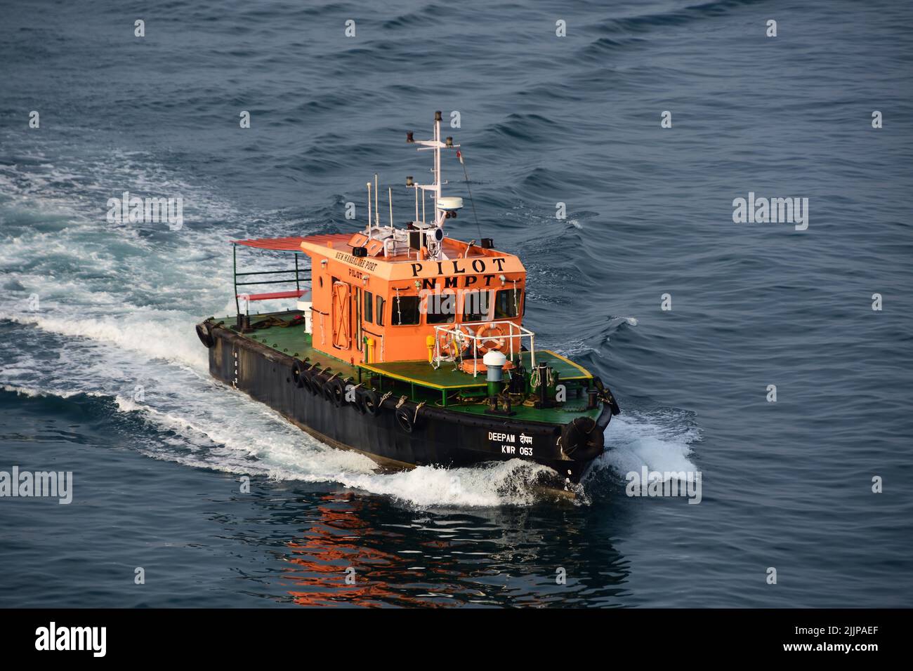 Picture shows a pilot boat at sea in New Mangalore, India Stock Photo
