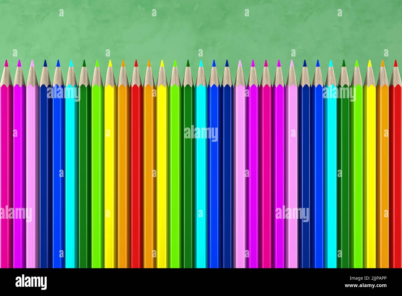 Ready for school concept with pencils in rainbow colors and blackboard background Stock Photo