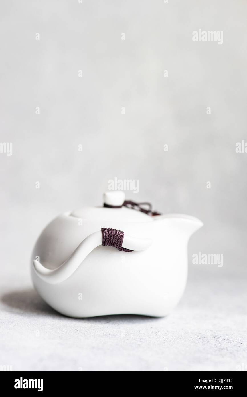 Close-up of an Asian tea pot on a table Stock Photo