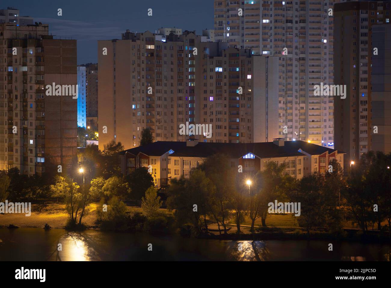 Night cityscape of the big city. Awesome bright, multi colored light at