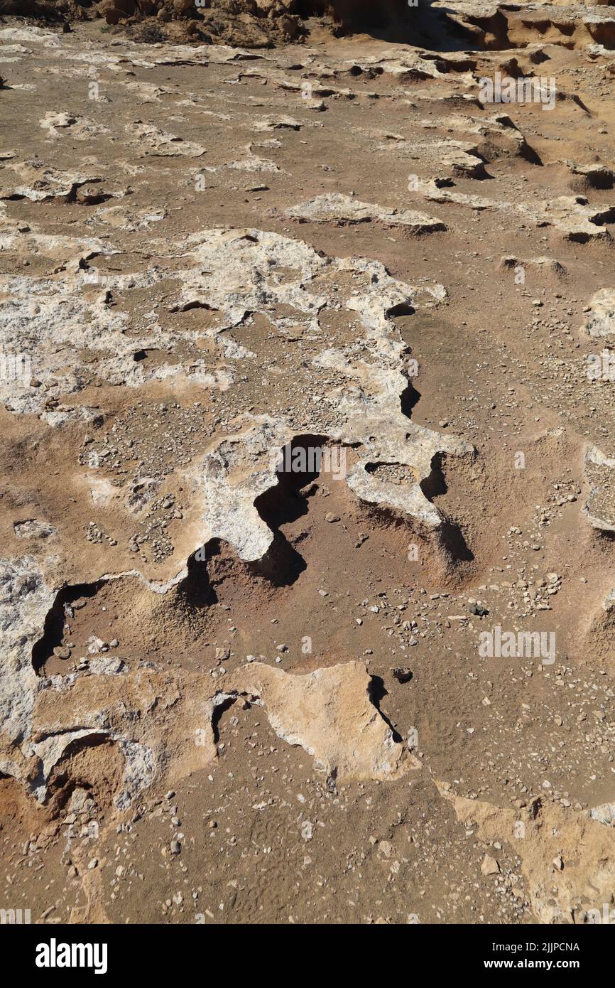 A vertical shot of texture of rocky dirt walking path on the Hawaiian Island of Kona Stock Photo
