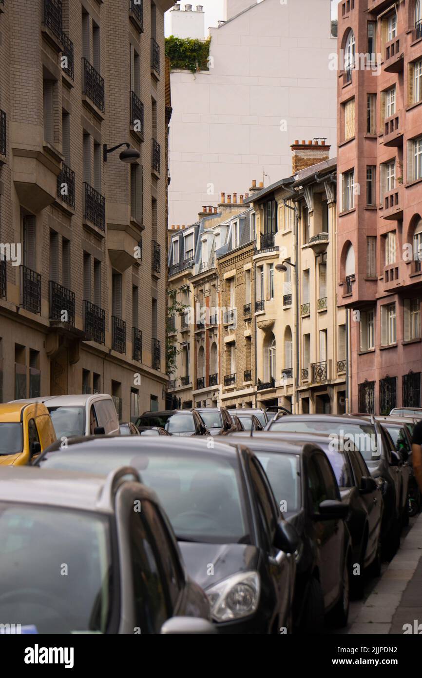 A vertical shot of cars driving in the street in Paris, France Stock Photo