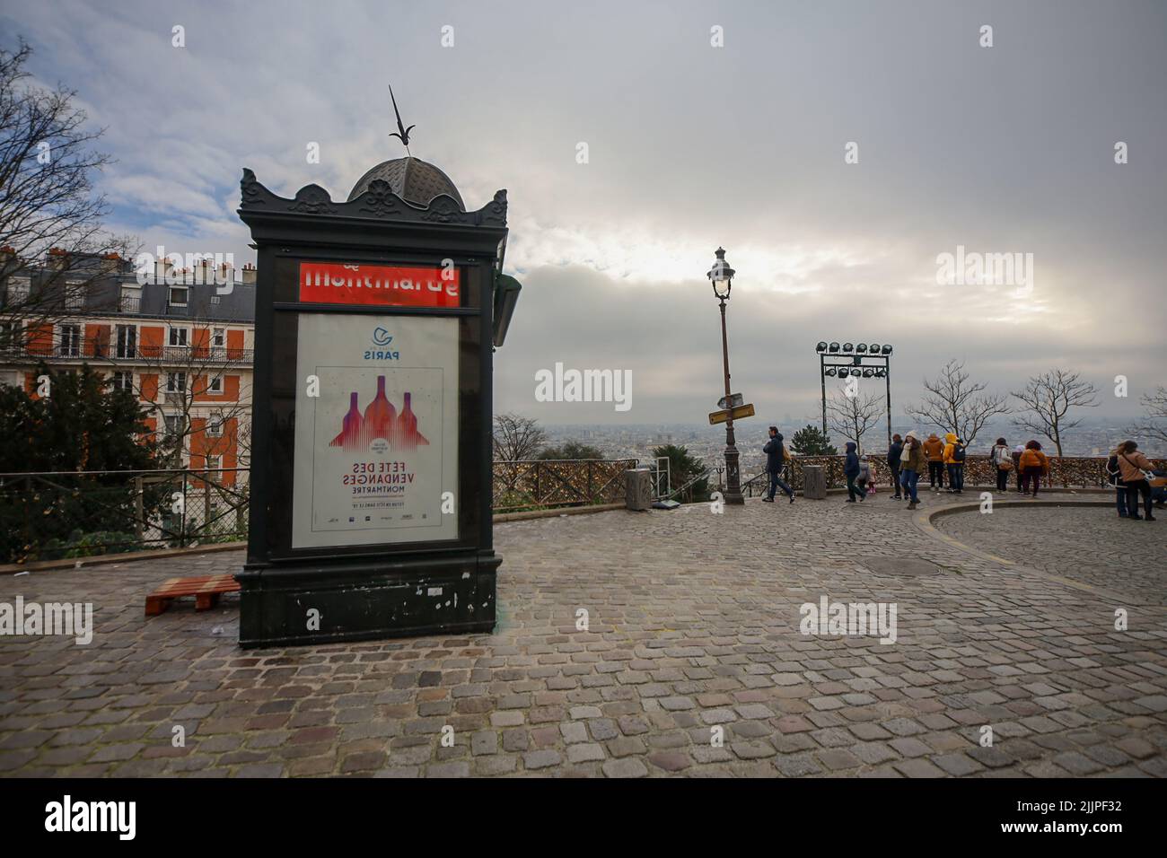 An advertising column in Paris, France, on a cloudy day Stock Photo