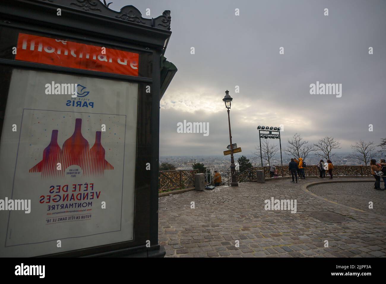 An advertising column in Paris, France, on a cloudy day Stock Photo