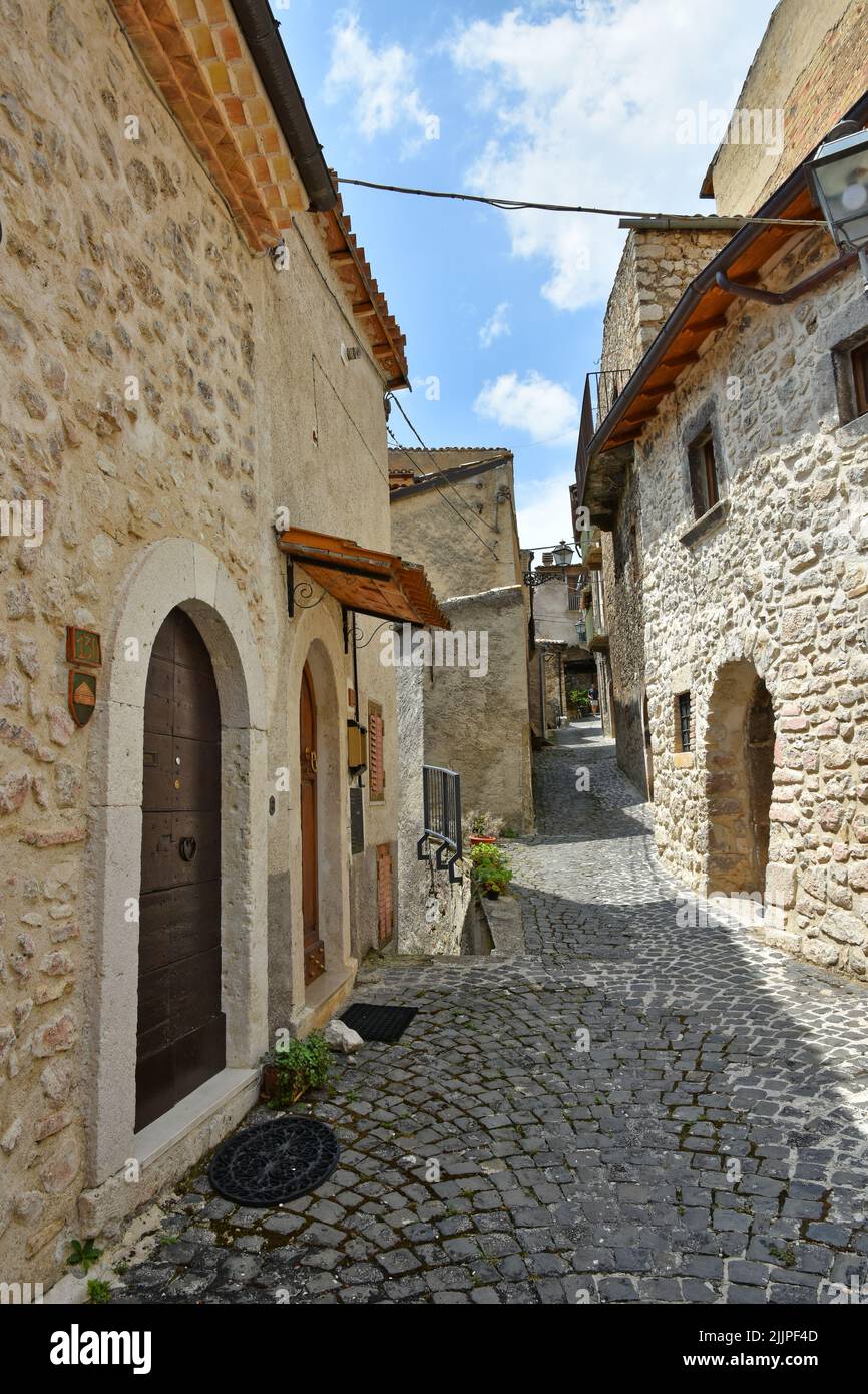A view of narrow street among old stone houses of Pacentro Stock Photo