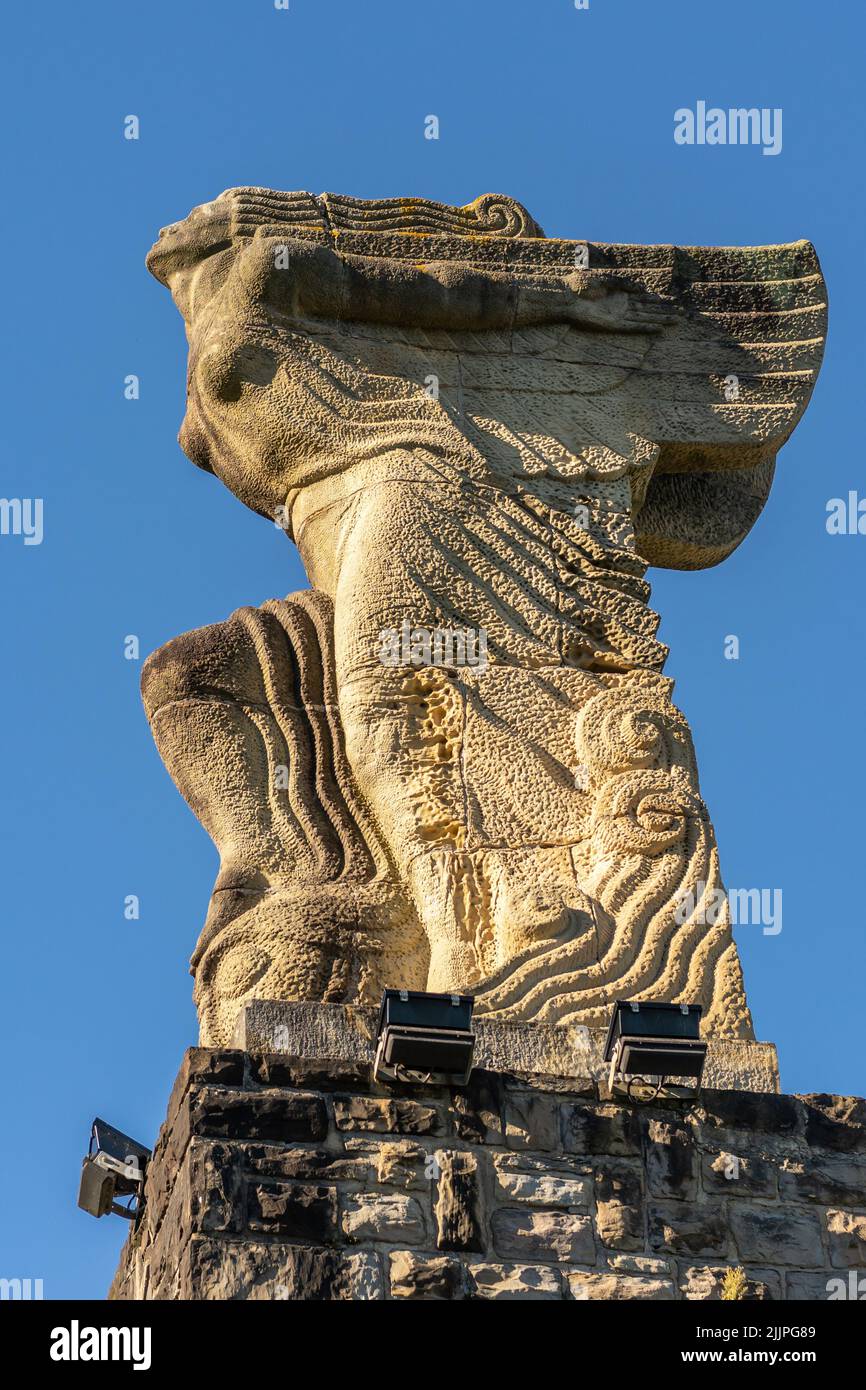 A vertical shot of an old statue in the town of Guetaria in Guipuzcoa Stock Photo