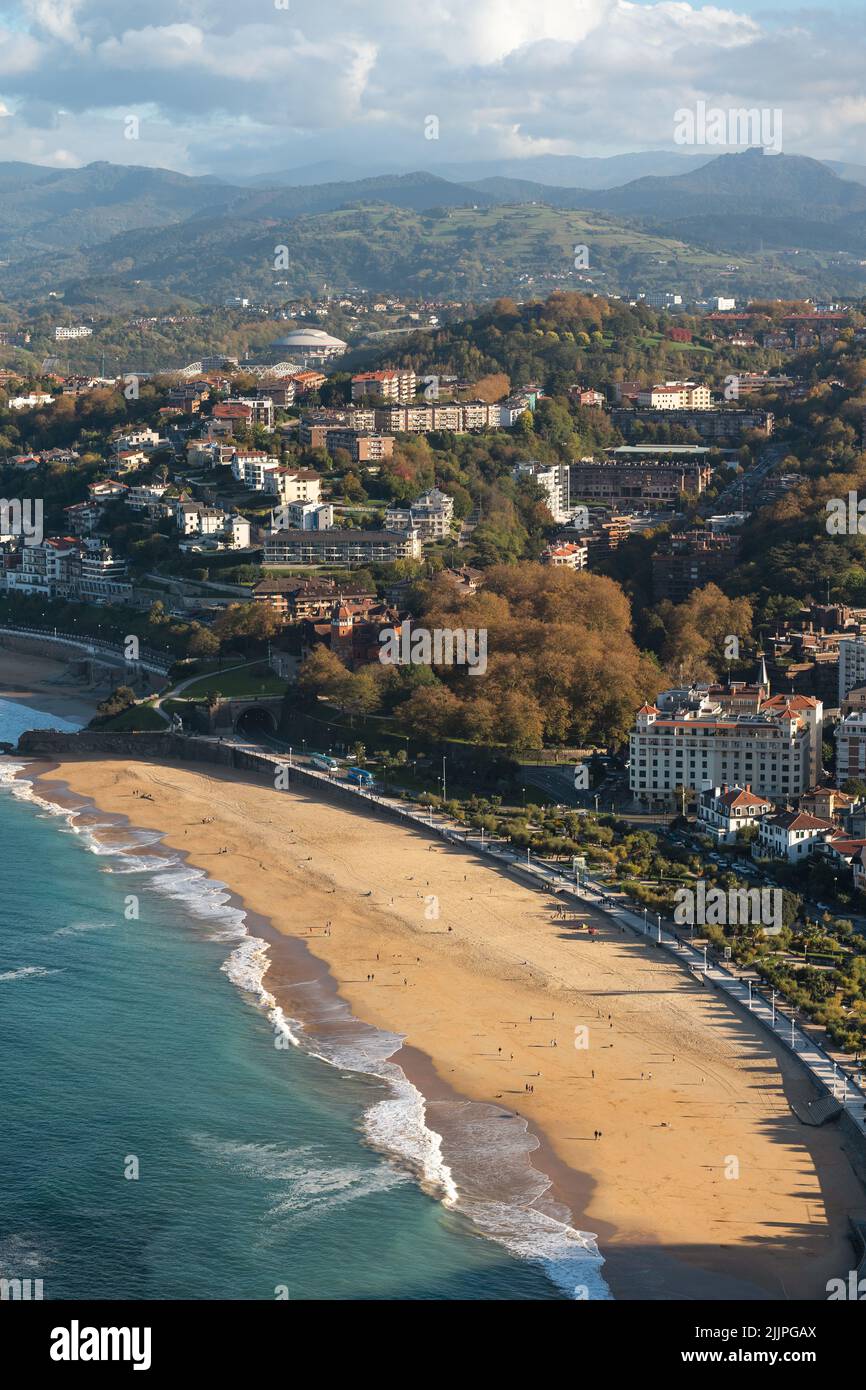 An aerial shot of the scenic beach at the Bay of Biscay in San Sebastian, Spain Stock Photo