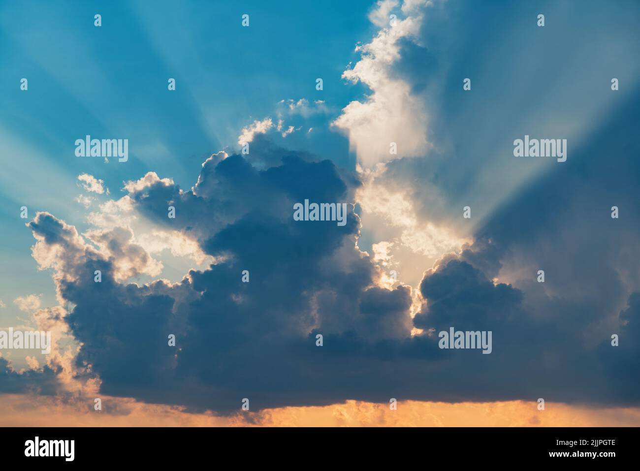 Amazing cloudscape on the sky at sunset time after rain Stock Photo - Alamy