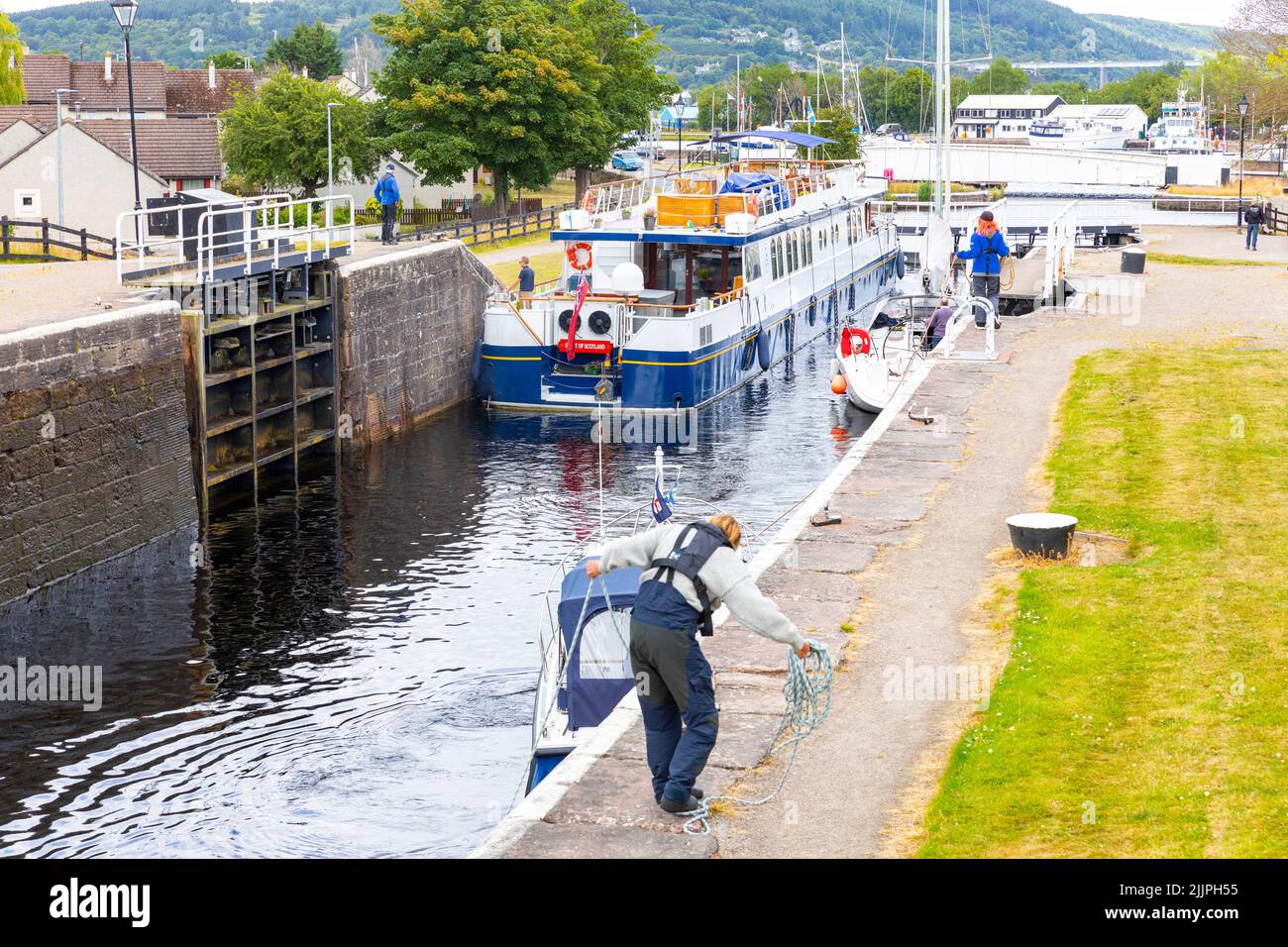 Spirit of Scotland boat passing through locks on the Caledonian canal in Inverness,Scottish highlands,Scotland,UK Stock Photo