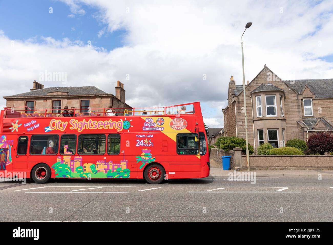 City sightseeing red open top bus in Inverness, capital of the Scottish highlands,Scotland,Uk on a summers day Stock Photo