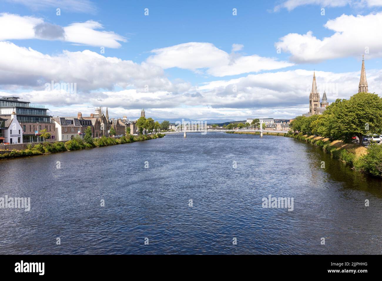 River Ness flowing through the city of Inverness, the capital of the Scottish Highlands,Scotland on a sunny summers day in July 2022,Uk Stock Photo