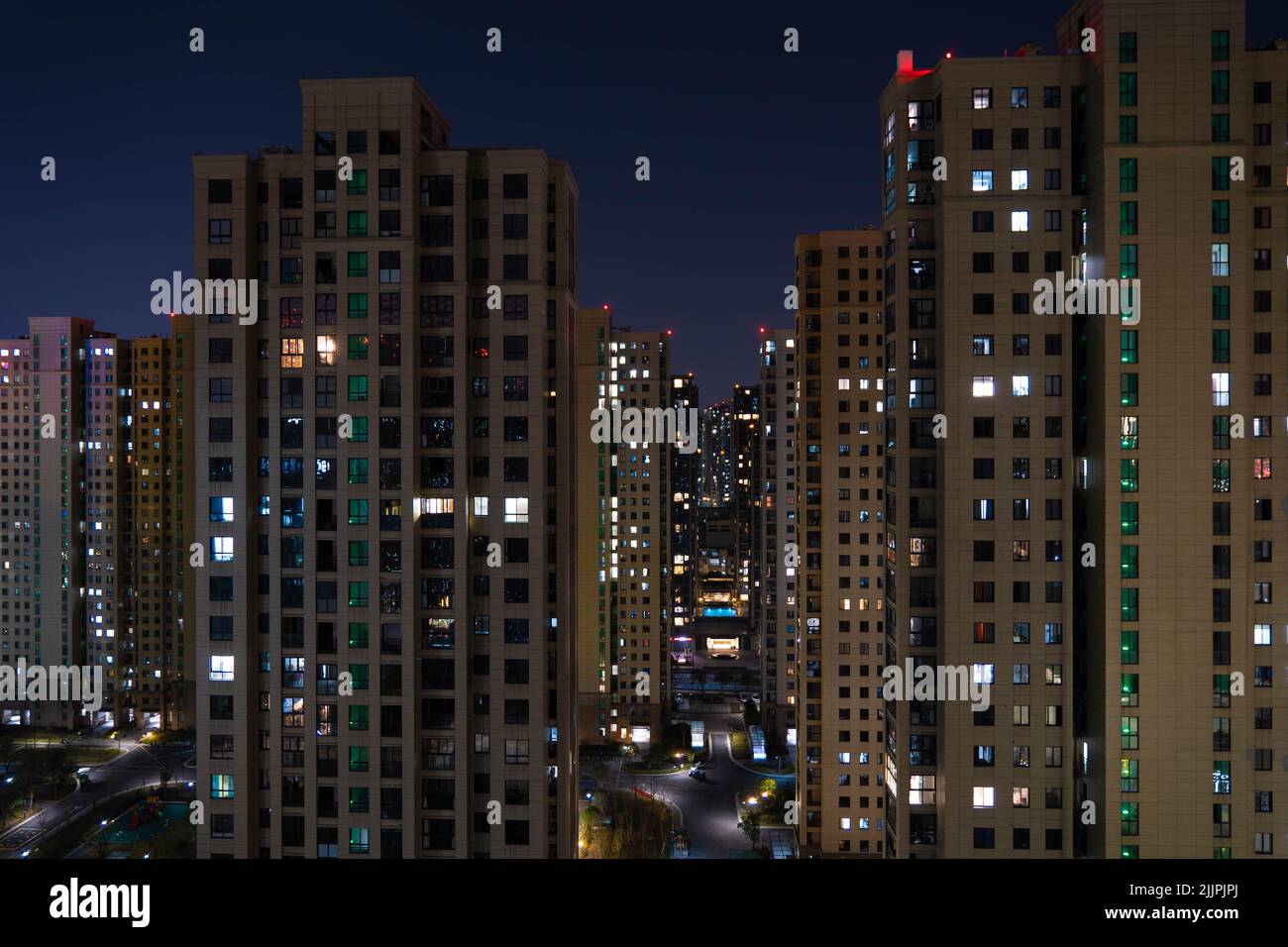 An aerial shot of modern buildings during the dark night Stock Photo ...