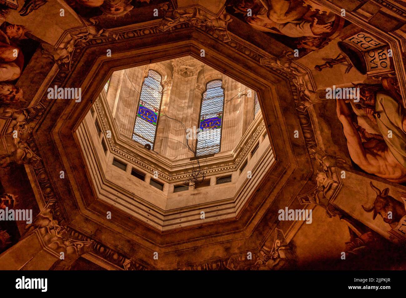 A low angle shot of the dome of a cathedral in Florence from inside ...