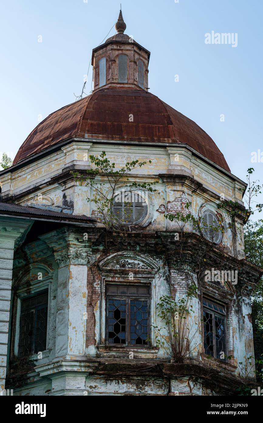 A vertical shot of an old British Tax office colonial building in ...
