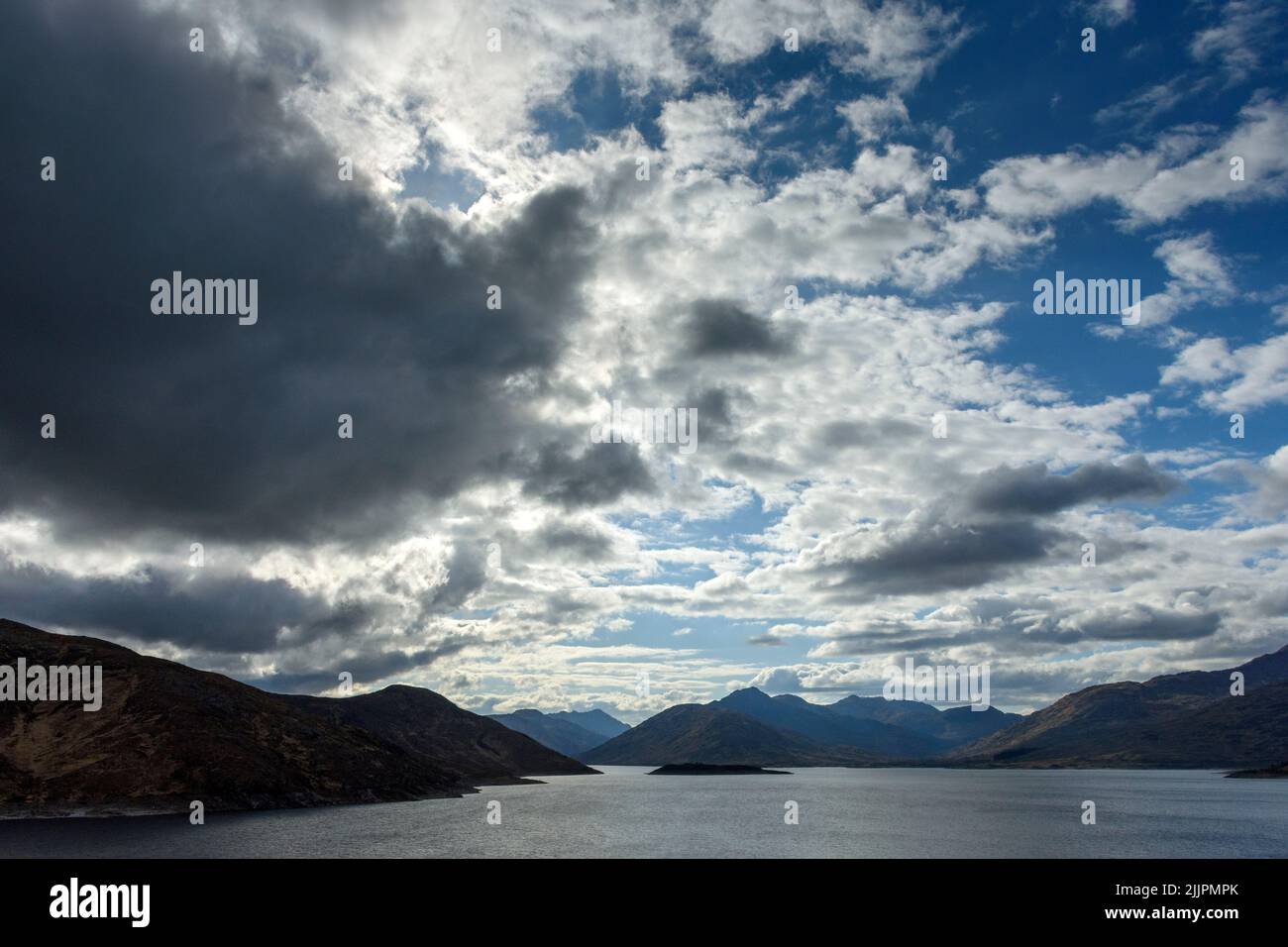 The mountains of Knoydart over Loch Quoich (Loch Chuaich), Glen Garry, Highland Region, Scotland, UK Stock Photo