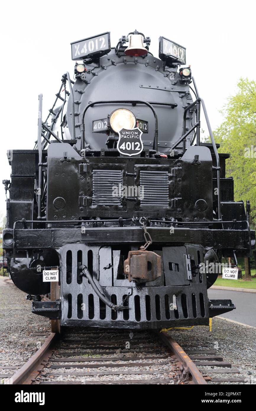 The old and historic steam train on track in a museum Stock Photo - Alamy