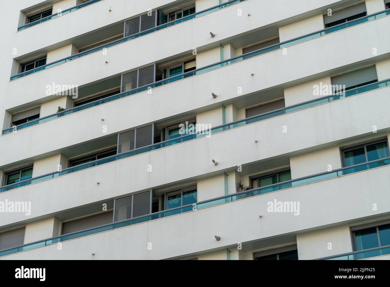A closeup shot of residential building facade in white and blue Stock Photo
