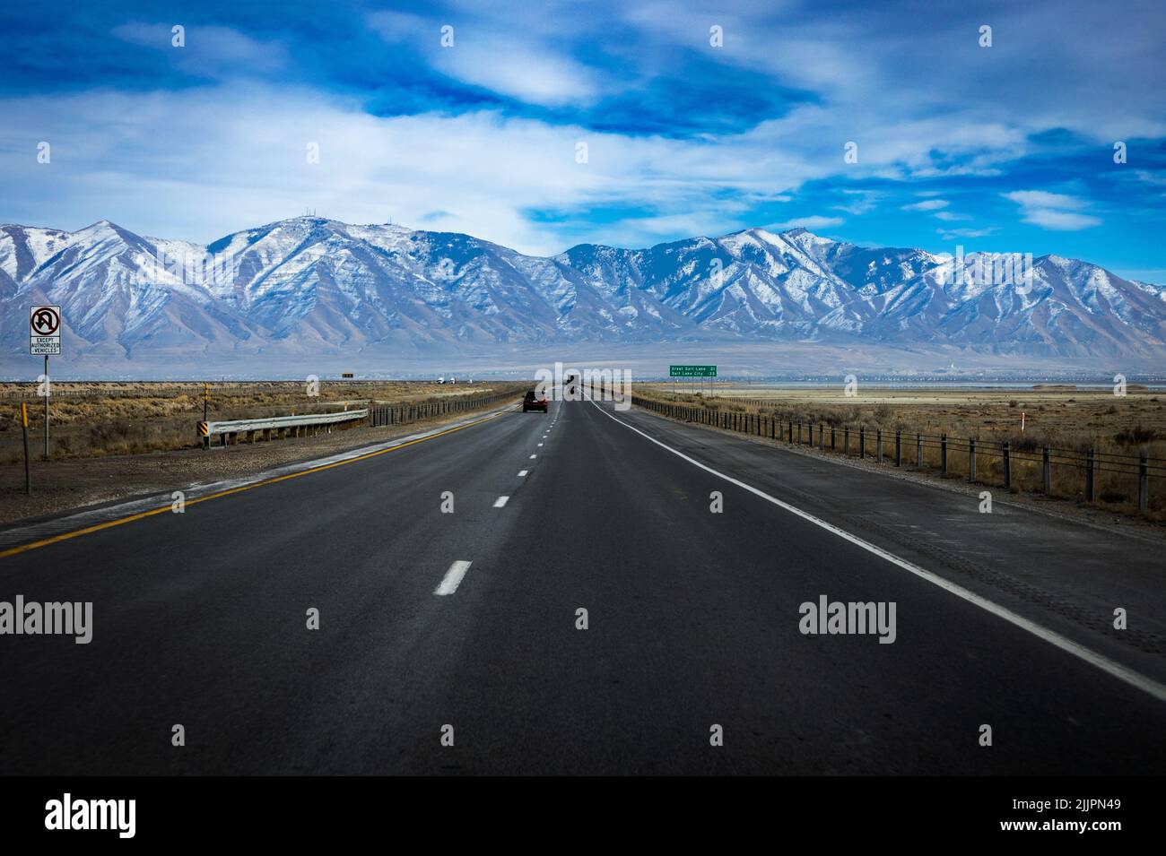 The Great American Open Road with mountains in the background Stock Photo
