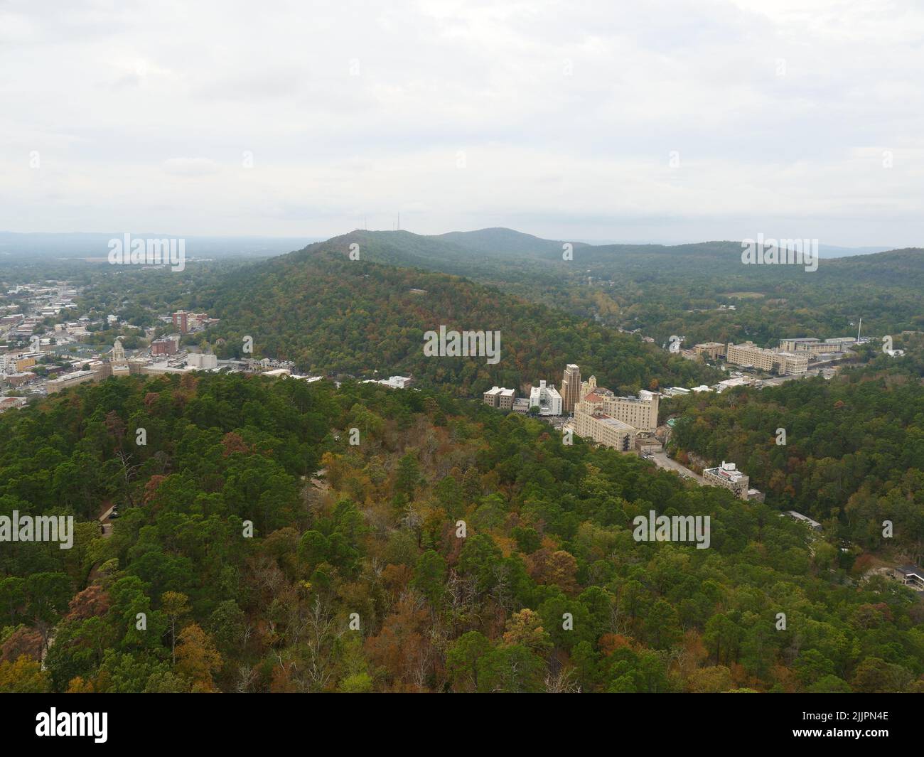 An aerial cityscape of Arkansas surrounded by buildings and trees Stock Photo