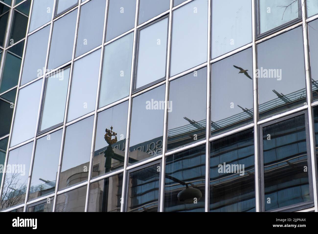 A building with mirror windows reflecting the outdoors Stock Photo Alamy