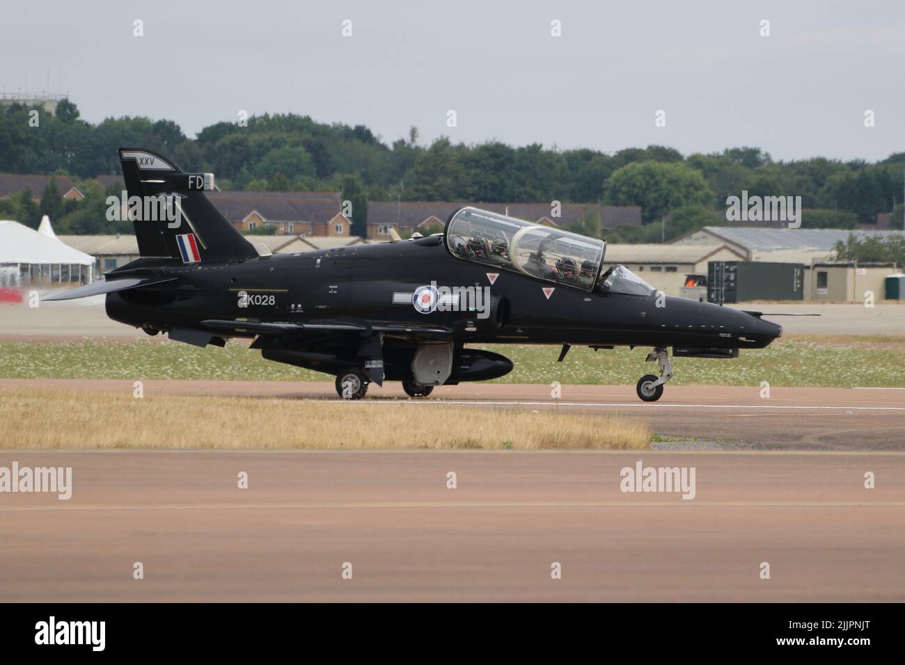 ZK028, a BAE Systems Hawk T2 operated by 25 Squadron, Royal Air Force, arriving at RAF Fairford in Gloucestershire, England, to participate in the Royal International Air Tattoo (RIAT) 2022. Stock Photo