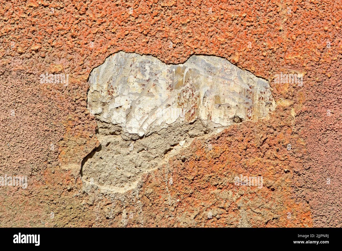 damaged white stone wall closeup, stress environment diversity Stock Photo
