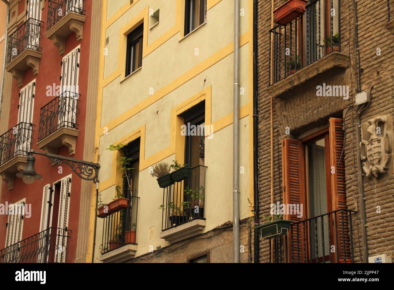 A facade view of the balconies of the apartment block in a neighborhood