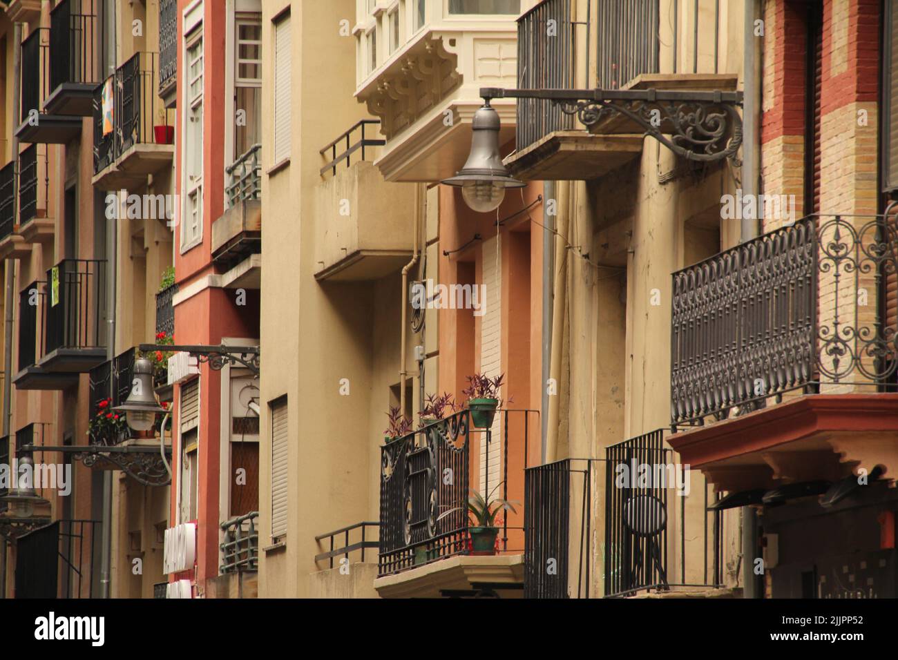 A facade view of the balconies of the apartment block in a neighborhood
