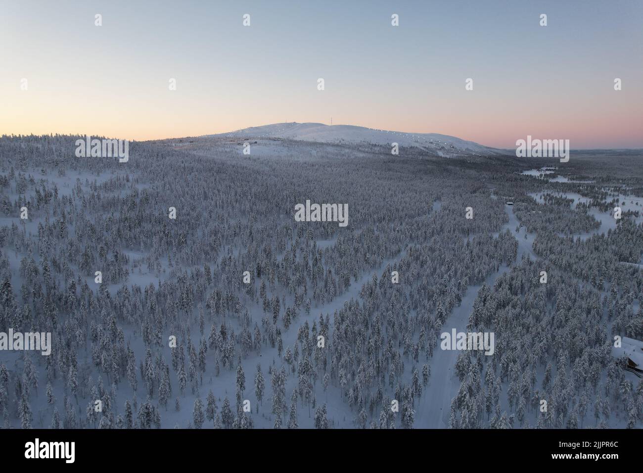 An aerial view of a hut in a snowy forest Stock Photo - Alamy
