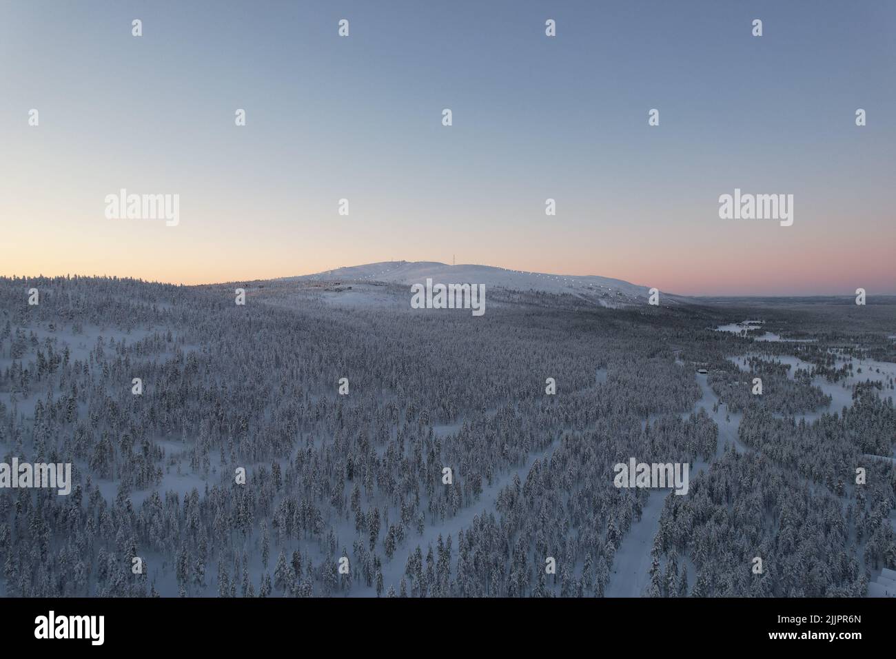 An aerial view of a hut in a snowy forest Stock Photo - Alamy
