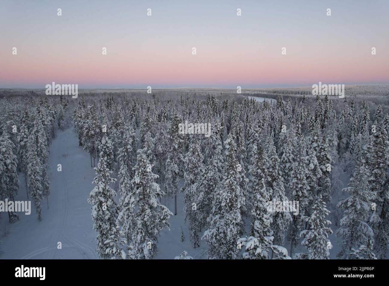 An aerial view of a hut in a snowy forest Stock Photo - Alamy