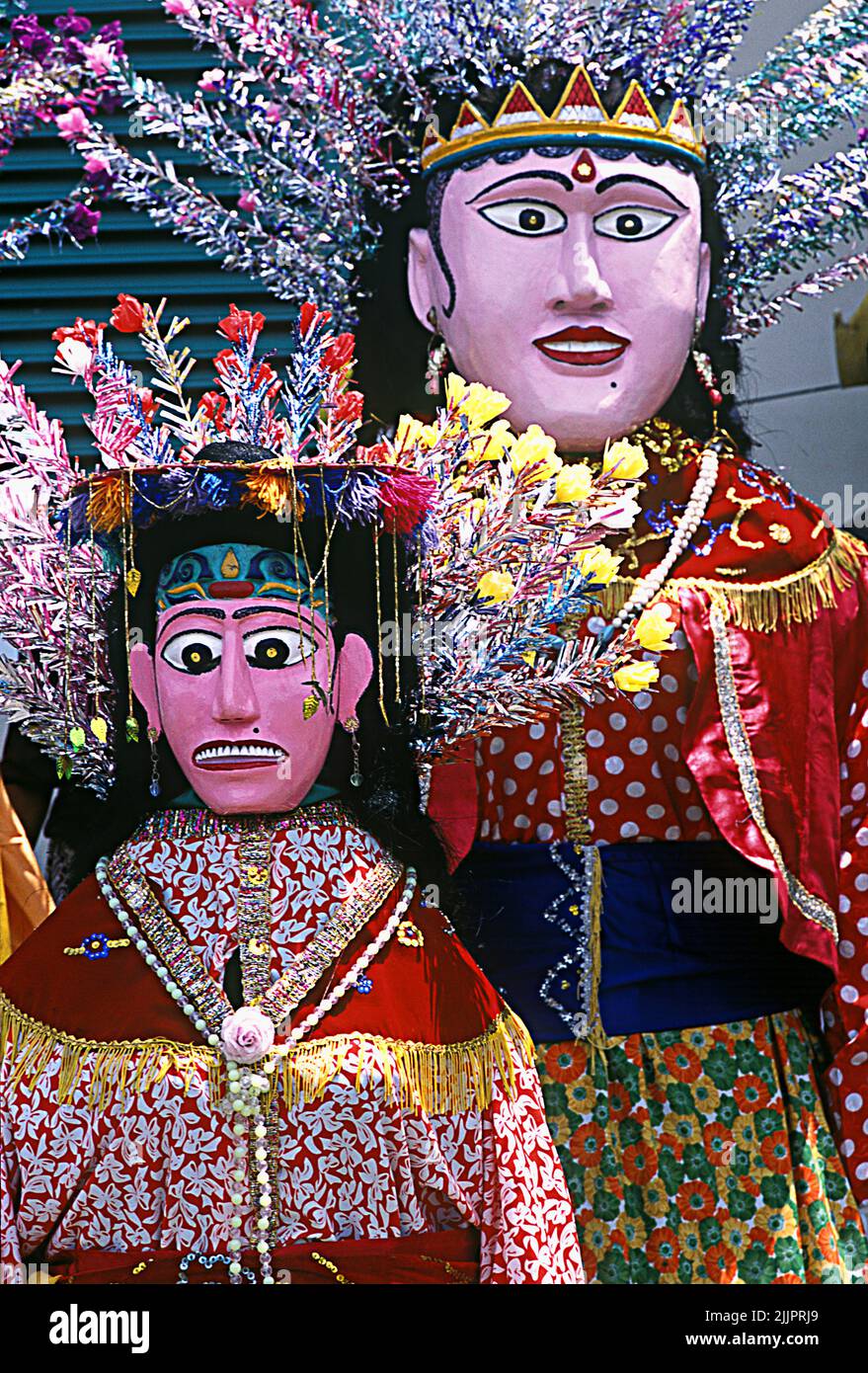 A vertical shot of two large puppet figures called Ondel-ondel in Jakarta, Indonesia Stock Photo