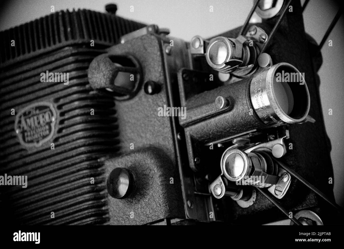 A grayscale of a vintage and antique film projector looking cool Stock Photo