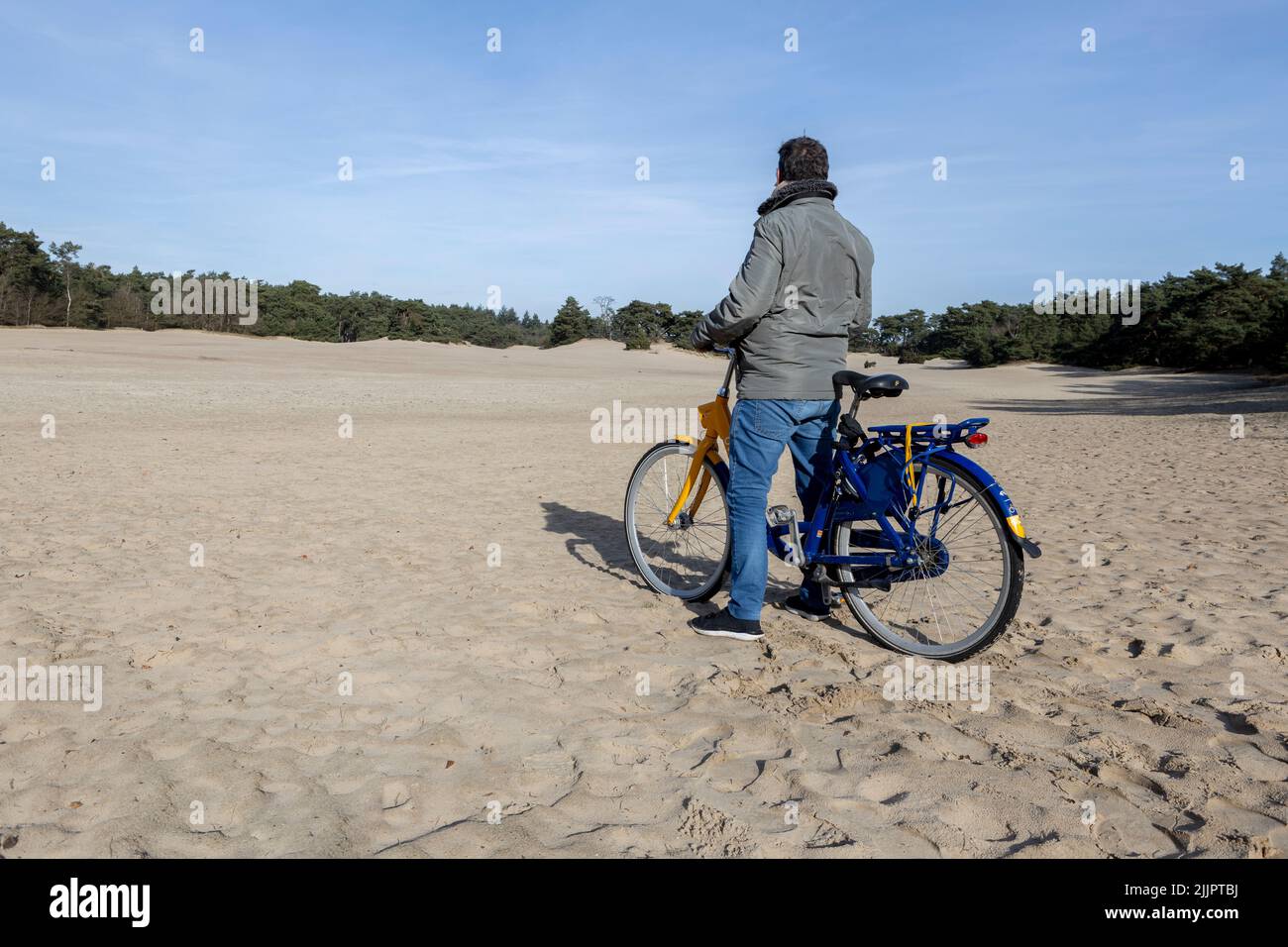 Male person with OV-fiets bike part of Dutch public transportation ...