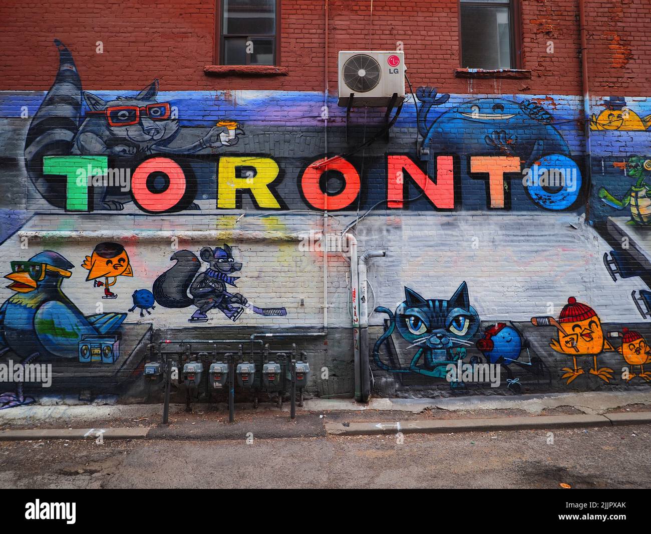 A colorful graffiti wall on the Graffiti Alley in downtown Toronto
