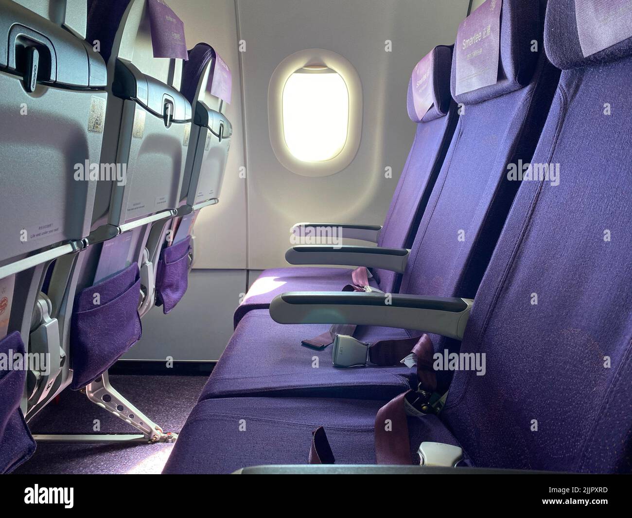 Airplane special purple cabin in a nice sunny day when takeoff Stock Photo