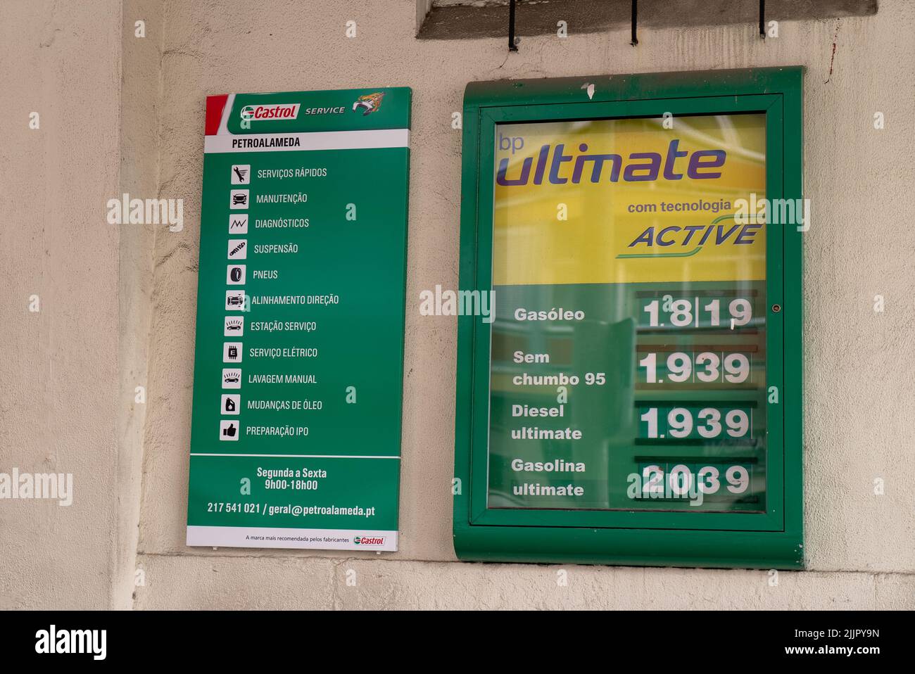 A gasoline pump fuel price list sign Stock Photo Alamy