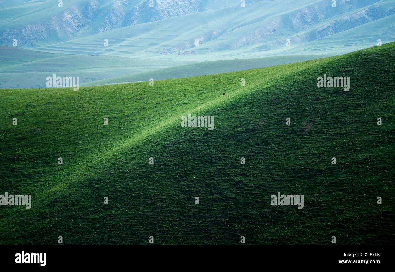 A beautiful view of a landscape with green valley and hills Stock Photo ...