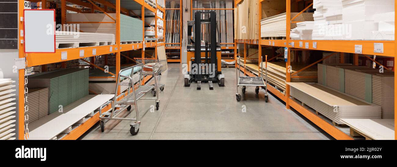 interior of a wholesale warehouse for the sale of gypsum board OSB panels and wood veneer with